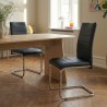 Lot de 2 chaises MARA simili noir pieds métal chromé